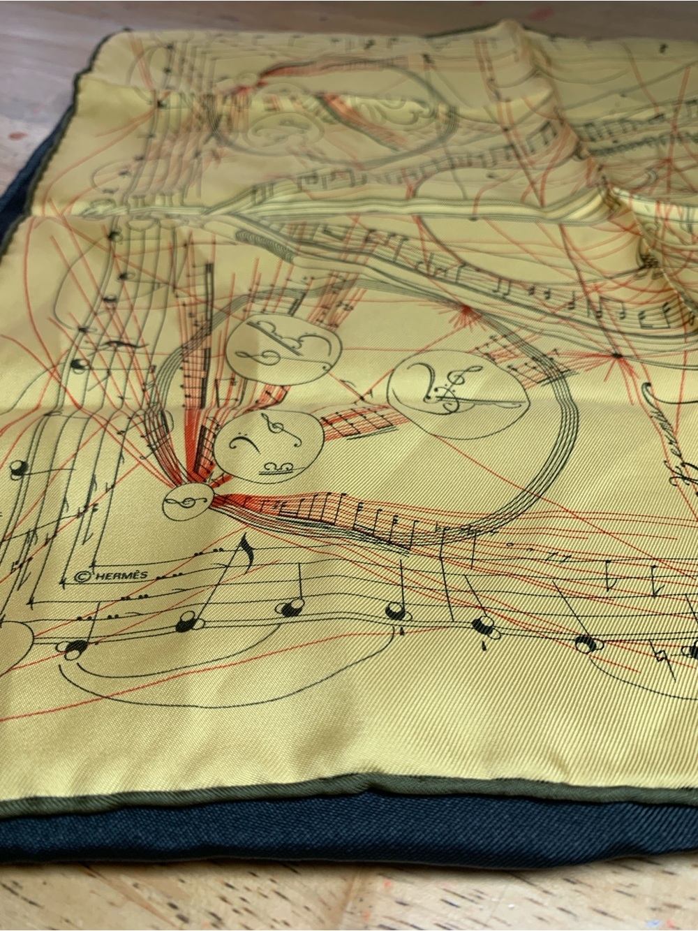 Hermes Yellow Silk Scarf with Red and Black Musical Motif